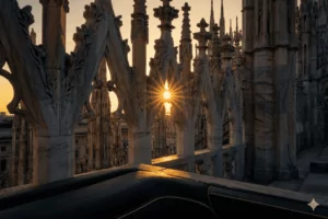Intricate marble spires of Duomo di Milano at sunset, representing luxury private tours in Milan Italy