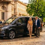 New Mercedes V-Class private chauffeur waiting outside luxury Milan hotel during early autumn events season